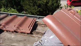 Legen der Dachplatten, Reparatur